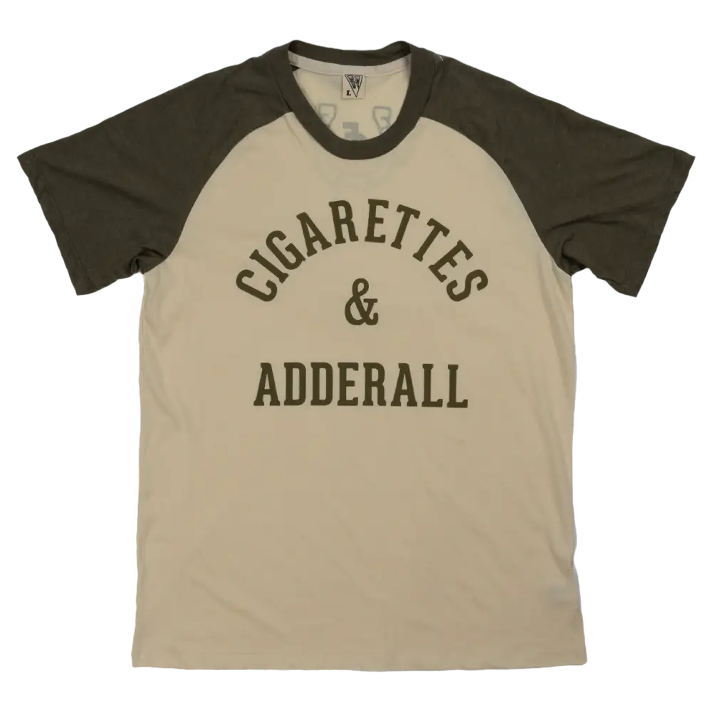 T-shirt with ’CIGARETTES & ADDERALL’ printed on the front in dark lettering.