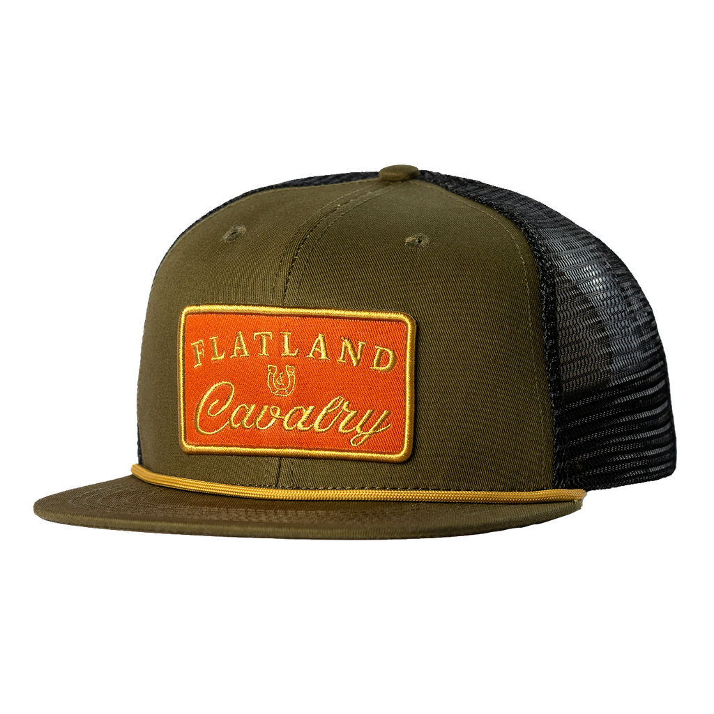 Olive green trucker hat with an orange ’Flatland Cavalry’ patch on the front.