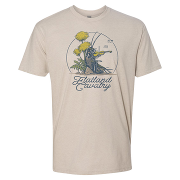 Beige t-shirt featuring a circular graphic design with dandelions and text reading ’Flatland Cavalry’.