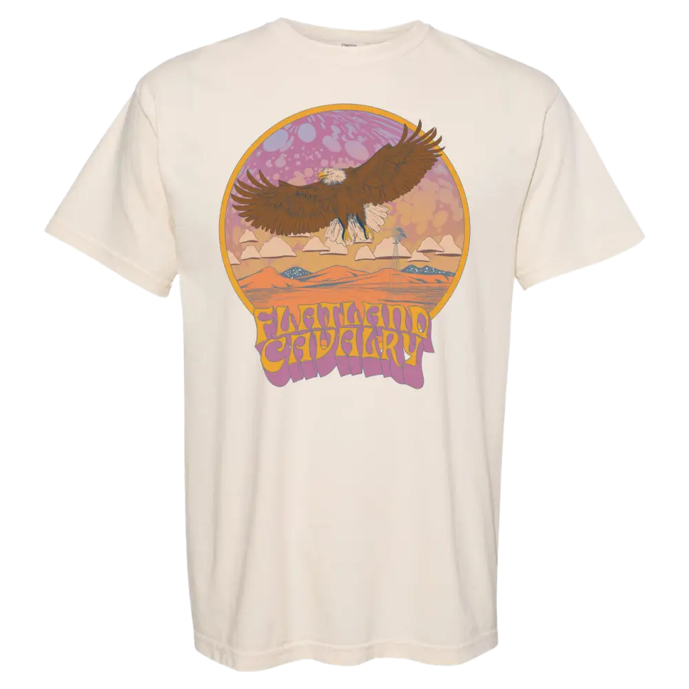 Cream-colored t-shirt featuring a retro-style graphic of an eagle soaring over a desert landscape.