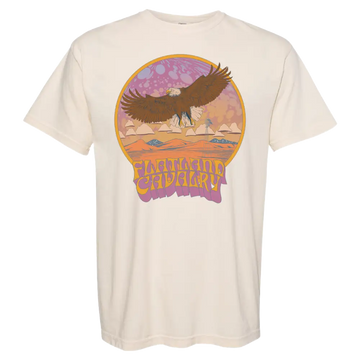 Cream-colored t-shirt featuring a retro-style graphic of an eagle soaring over a desert landscape.