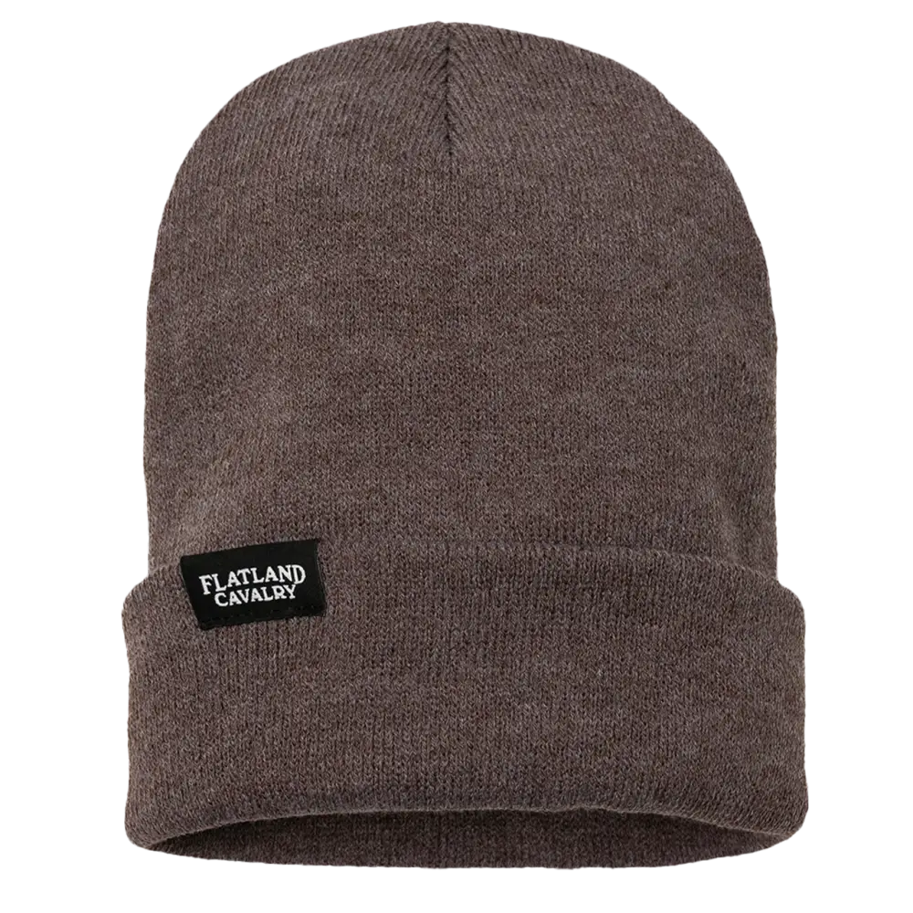 Brown knit beanie hat with a ’Flatland Clothing’ label.