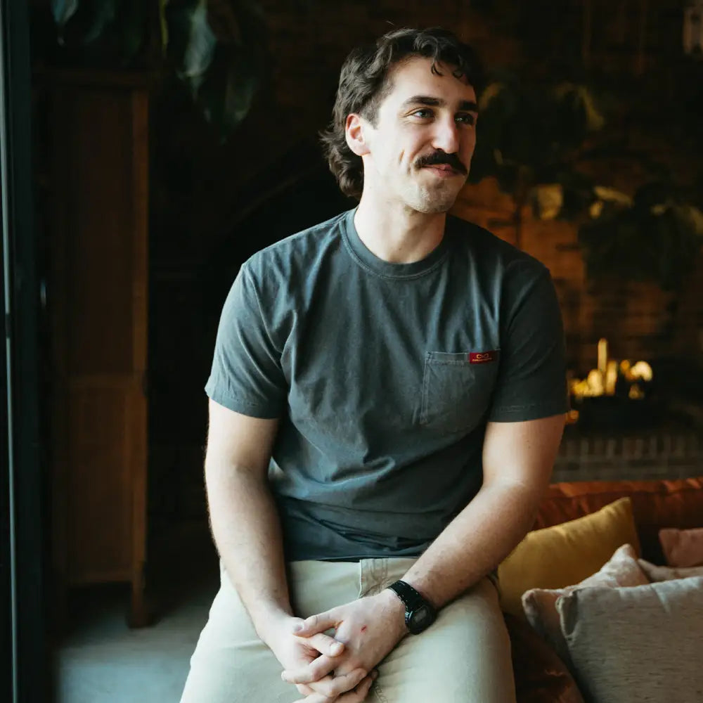 Man with mustache and mullet.