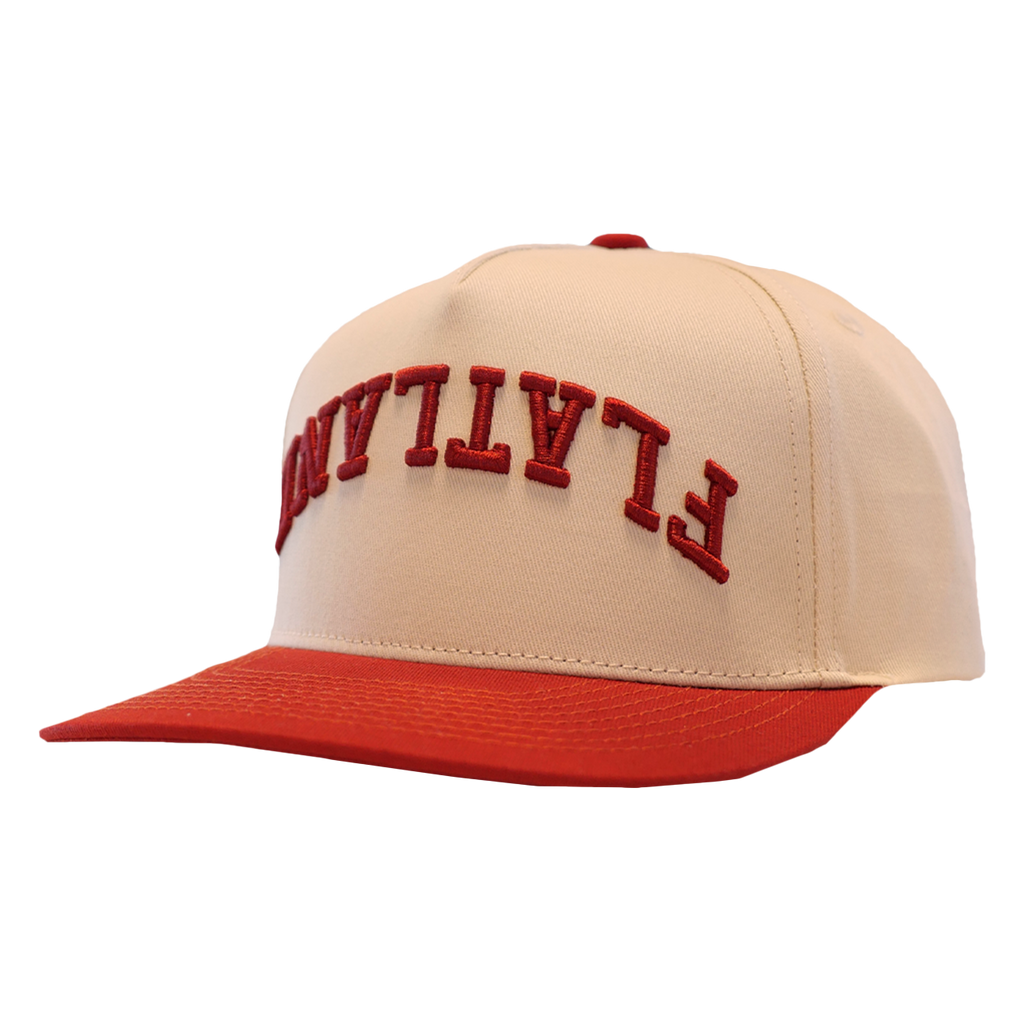 Red and cream baseball cap.