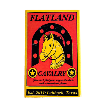 Colorful patch or emblem featuring a yellow horse head within a horseshoe shape on a red background.