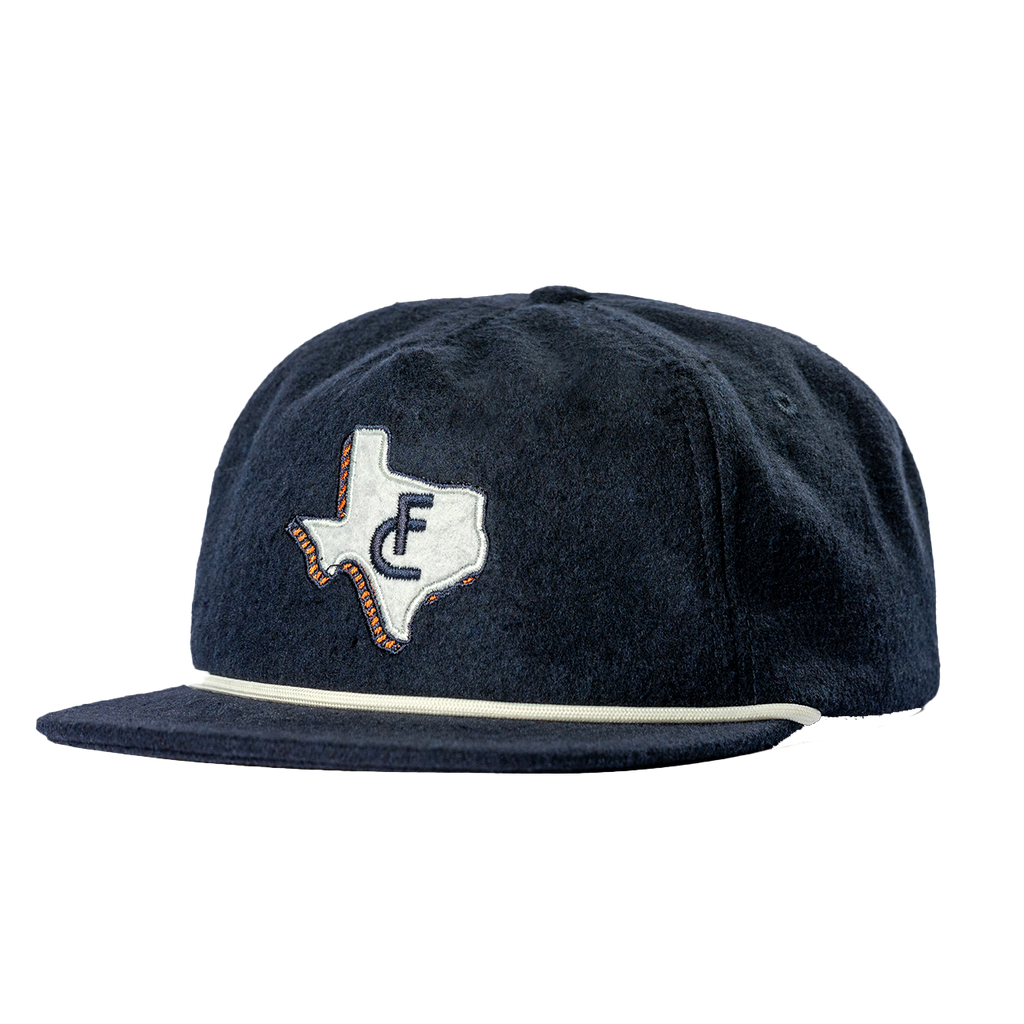 Navy blue baseball cap with a Texas-shaped logo featuring the letter ’F’.